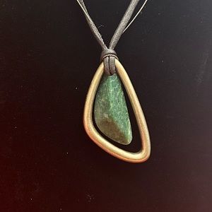 necklace with synthetic leather and steel pendant and green stone